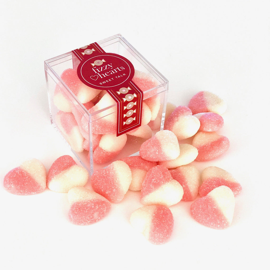Pink and white sour heart gummies