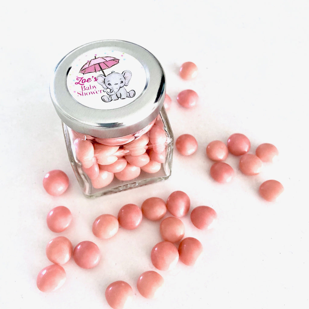 Coral pink fruit chew candy jar with Personalised Baby Shower label 
